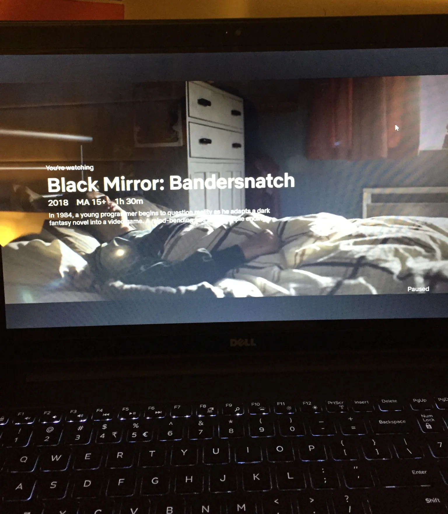 Netflix paused on laptop at 1:43am